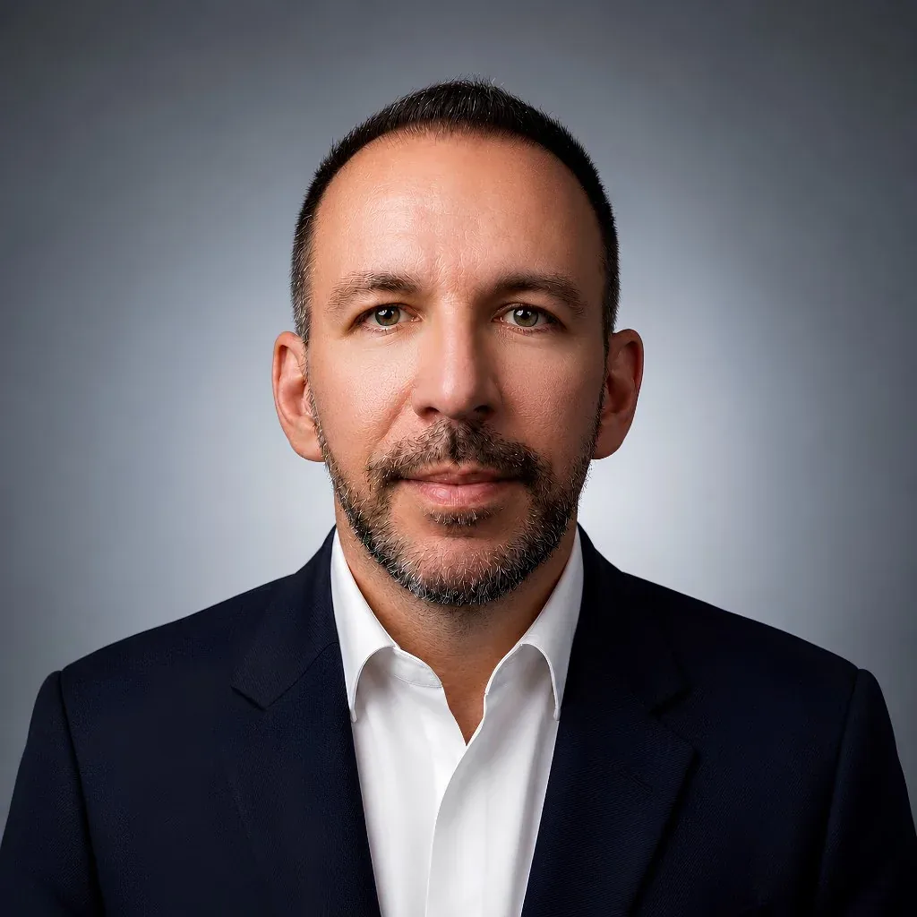 Portrait of Bjorn Laku, Director and CMO of Cashbook Finance